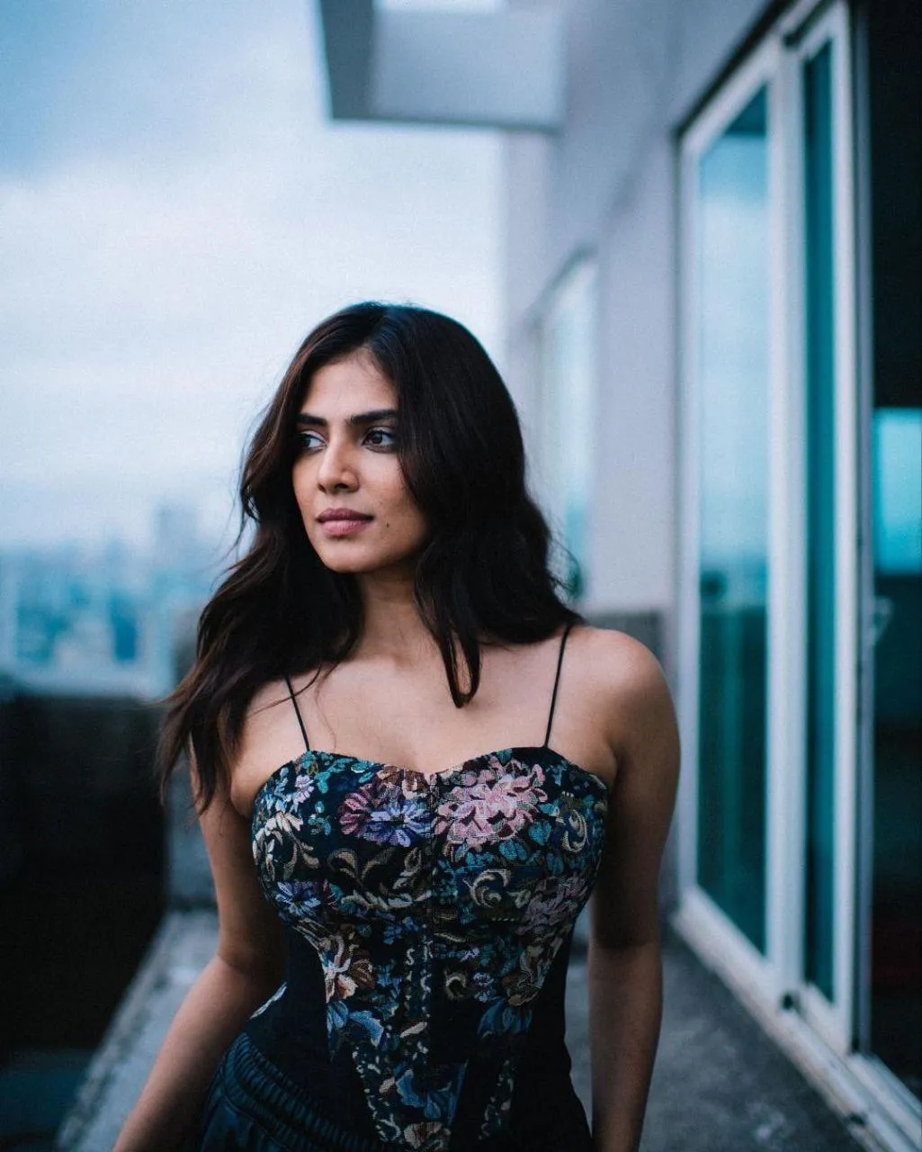 Hot Malavika Mohanan in Strapless Black Gown Window Pose