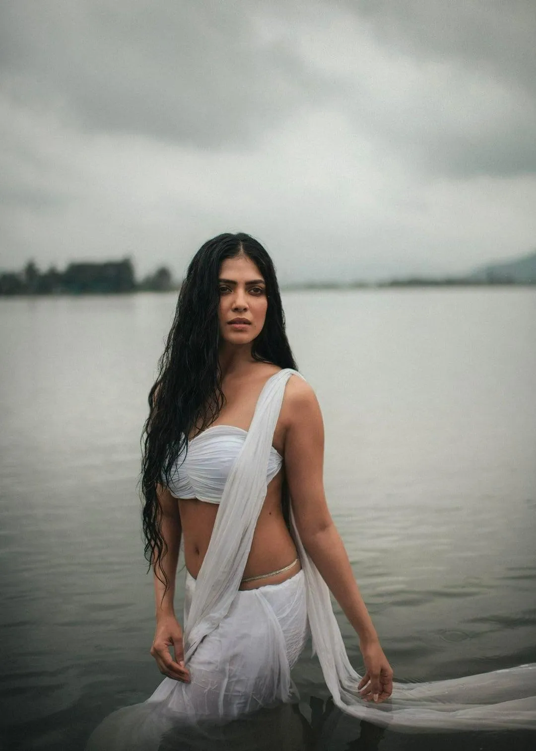 Hot Malavika Mohanan in White Saree Seaside Captivating