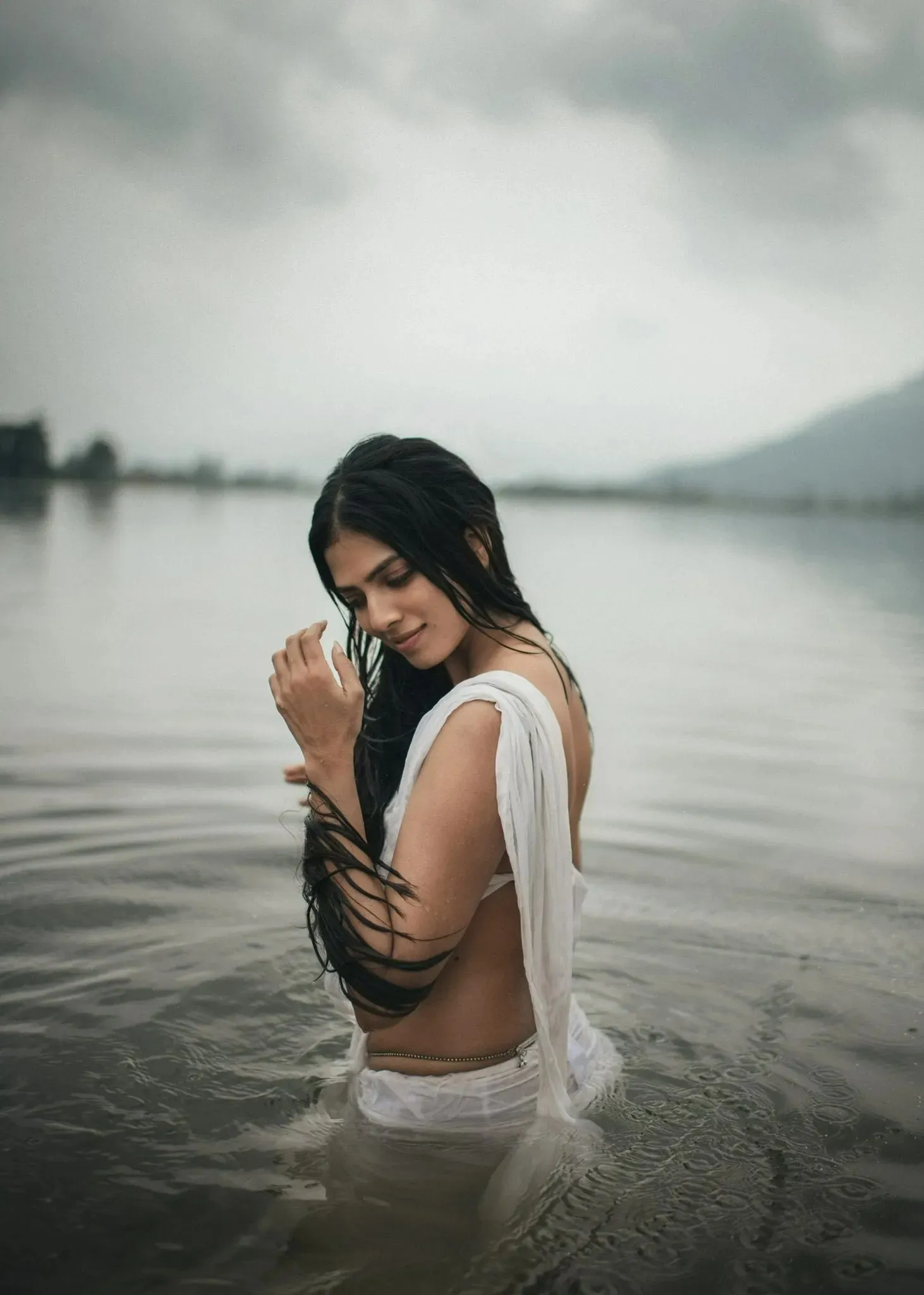 Hot Malavika Mohanan Posing in Lake with White Dress Look