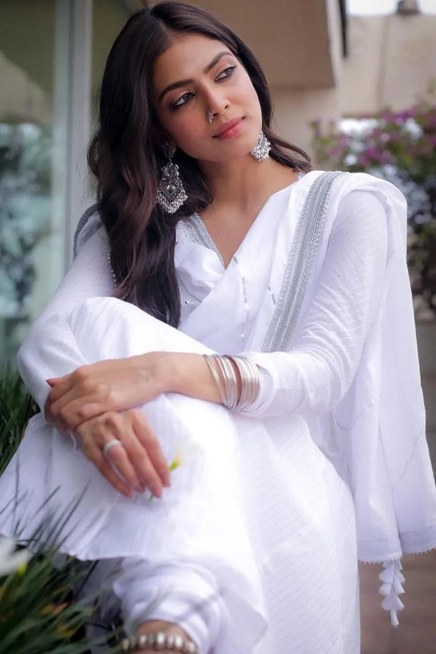 Hot Malavika Mohanan Walking in White Outfit with Scarf