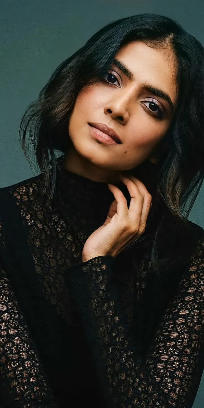 Hot Malavika Mohanan Wearing Black Dress Leaning on Wall