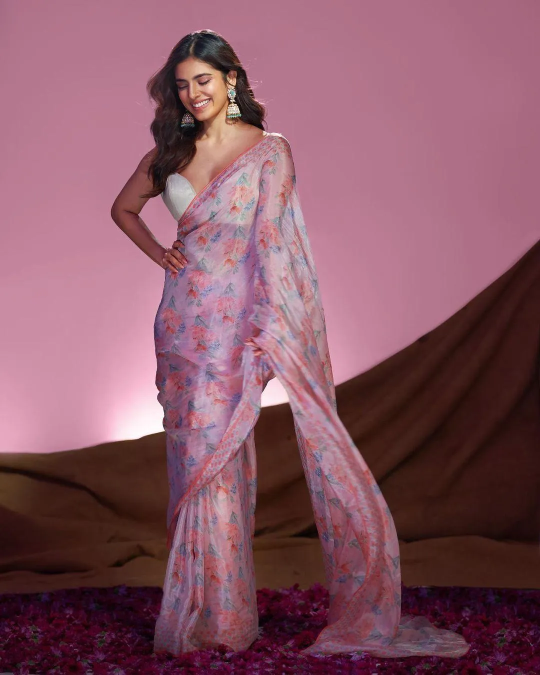 Hot Malavika Mohanan Wearing Elegant Sheer Pink Dress Image