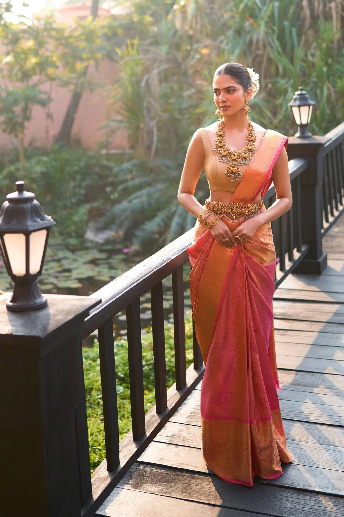 Hot Malavika Mohanan Wearing Orange Saree Elegant Outdoors