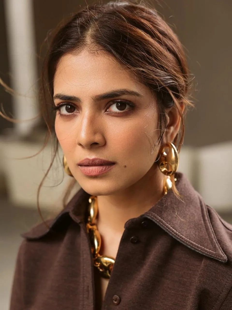 Hottie Malavika Mohanan in Brown Shirt Dress Elegant Pose