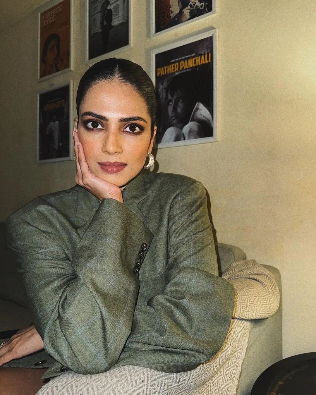 Hottie Malavika Mohanan in Olive Green Dress Casual Sitting