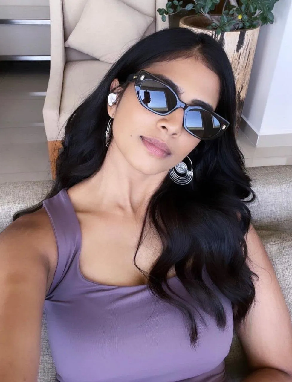 Hottie Malavika Mohanan in Sleeveless Purple Top Glasses