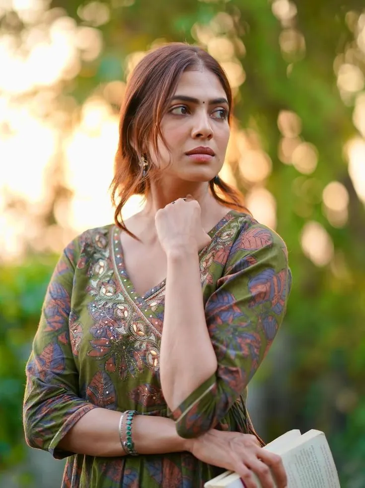 Malavika Mohanan Captured Naturally in Outdoor Setting Image