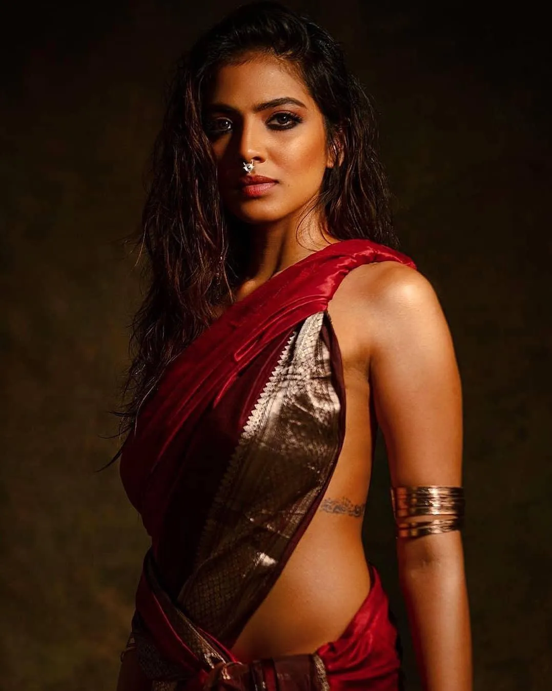Malavika Mohanan Dressed in Elegant Gorgeous Red Saree Image
