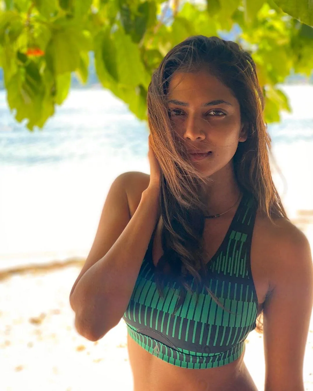 Malavika Mohanan in Outdoor Sensual Summer Attire Wallpaper