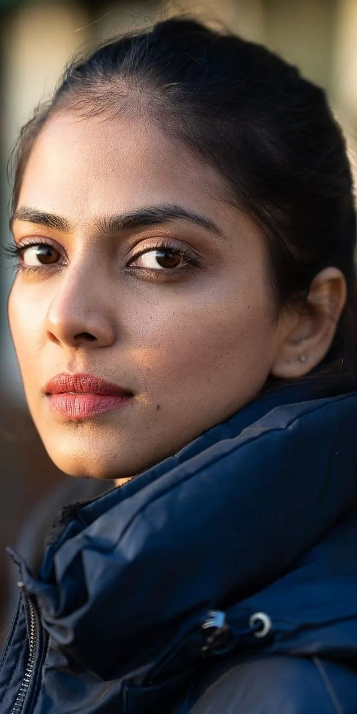 Malavika Mohanan in Outdoor Stunning Blue Coat HD Wallpaper