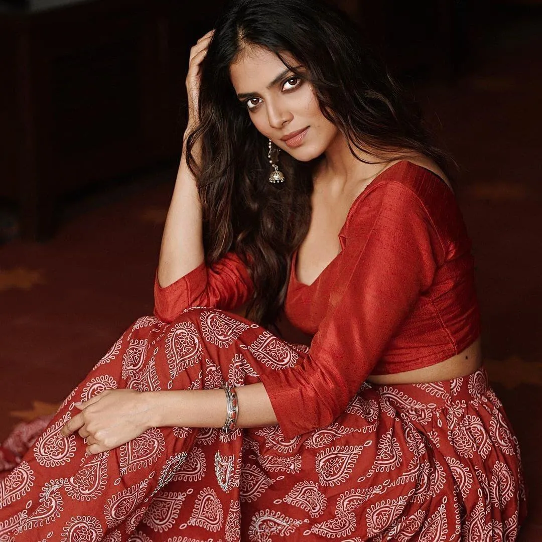 Malavika Mohanan Posing Elegantly in Beautiful Red Gown
