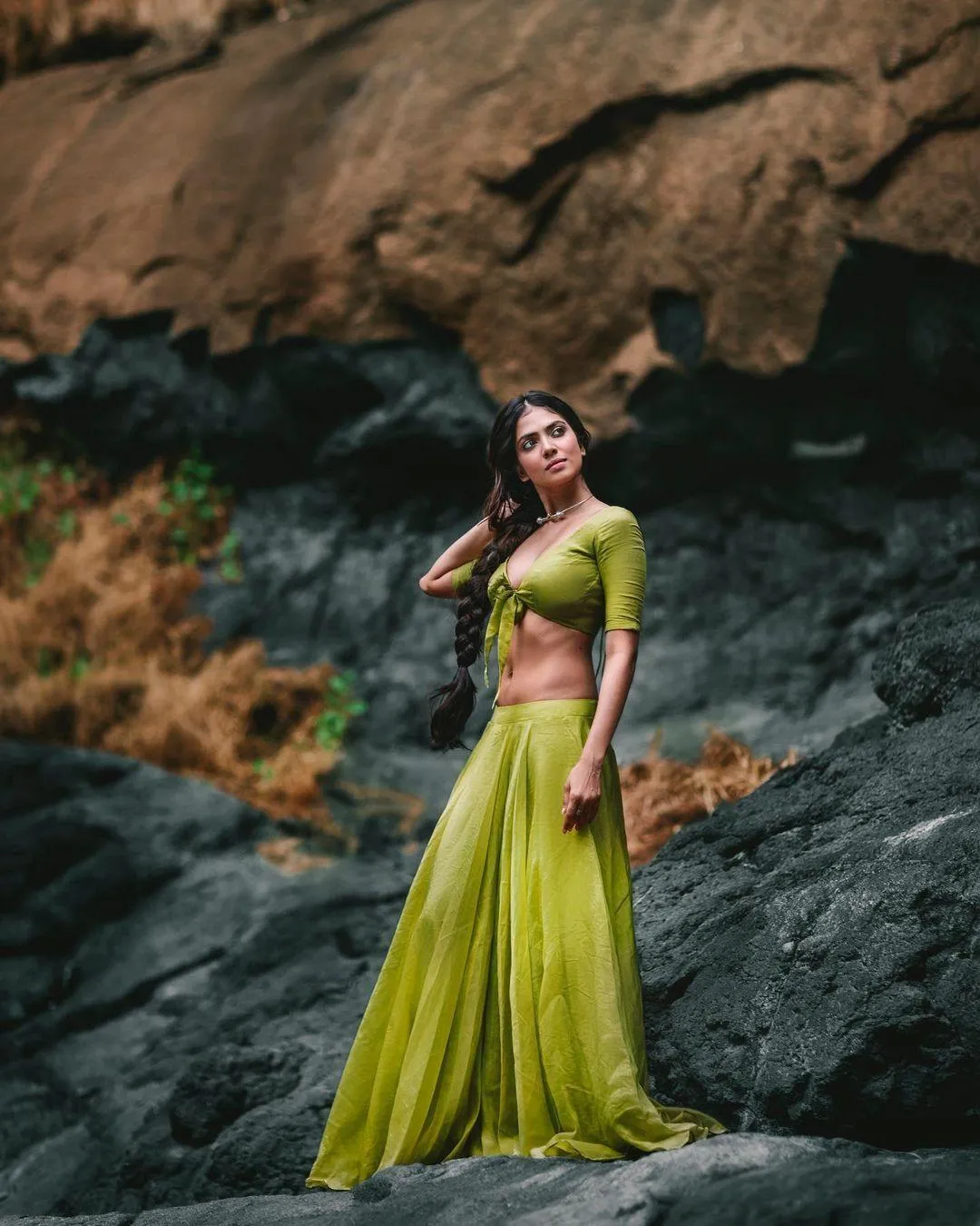 Malavika Mohanan Posing Outdoors in Flowing Yellow Dress