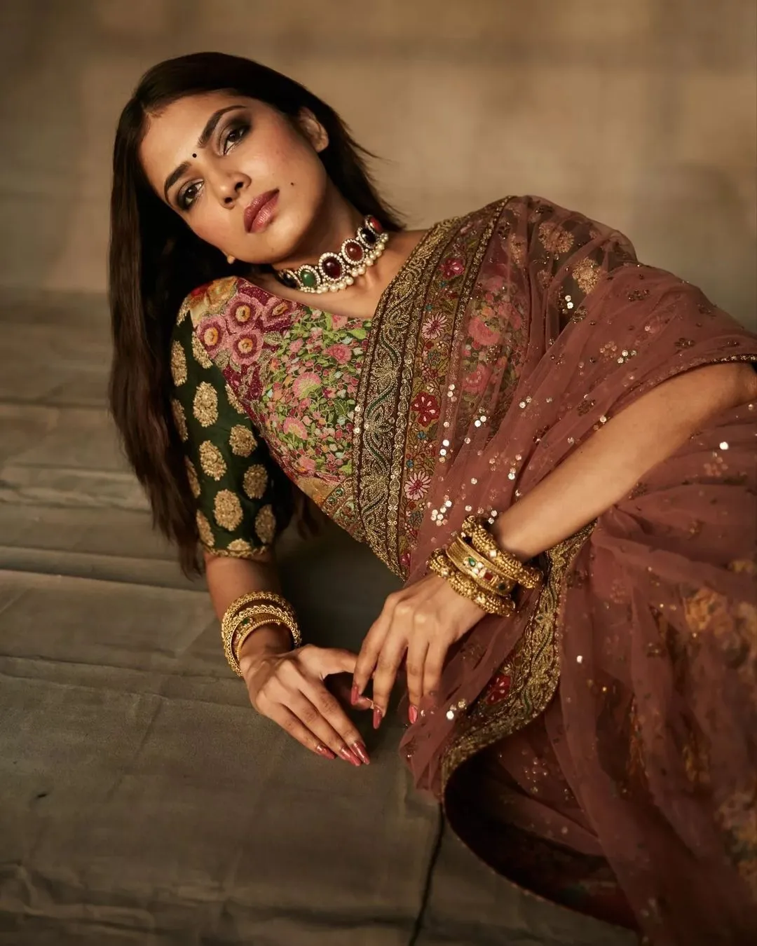 Malavika Mohanan Sensual in Traditional Brown Saree Pose