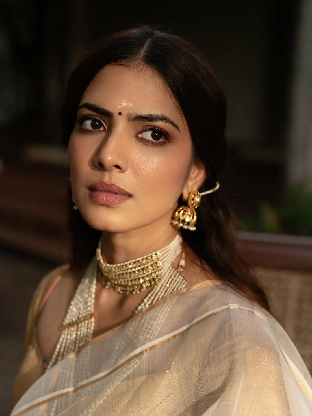 Malavika Mohanan Shows Hot Look in Simple White Outfit Image