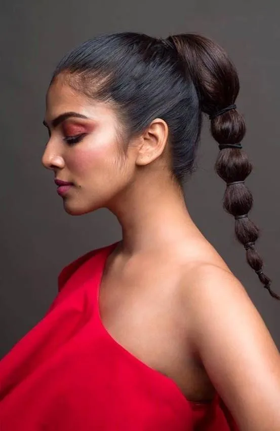 Profile Shot of Malavika Mohanan in Sultry Red Outfit Image