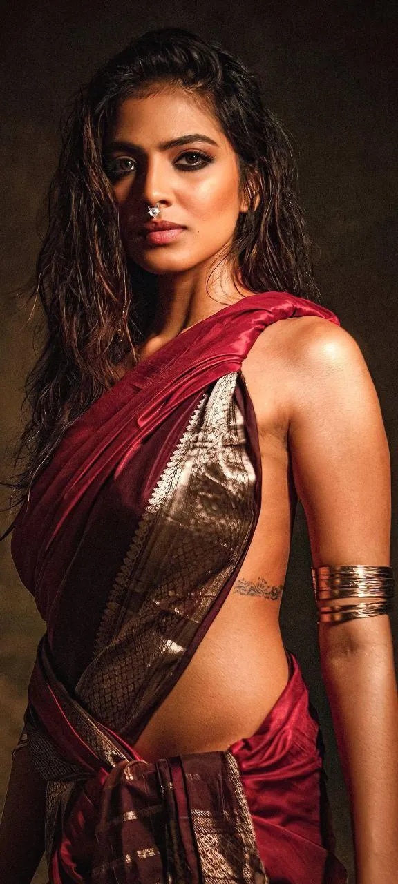 Sensual Malavika Mohanan Elegant Pose in Maroon Saree Look