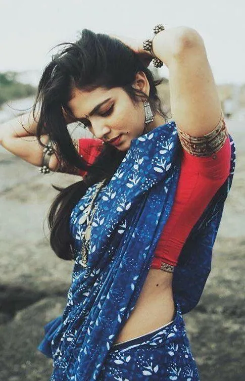 Sensual Malavika Mohanan in Blue Saree with Bright Smile