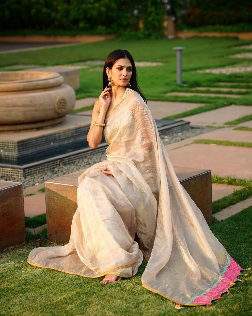 Sensual Malavika Mohanan in Cream Saree Outdoor Elegance