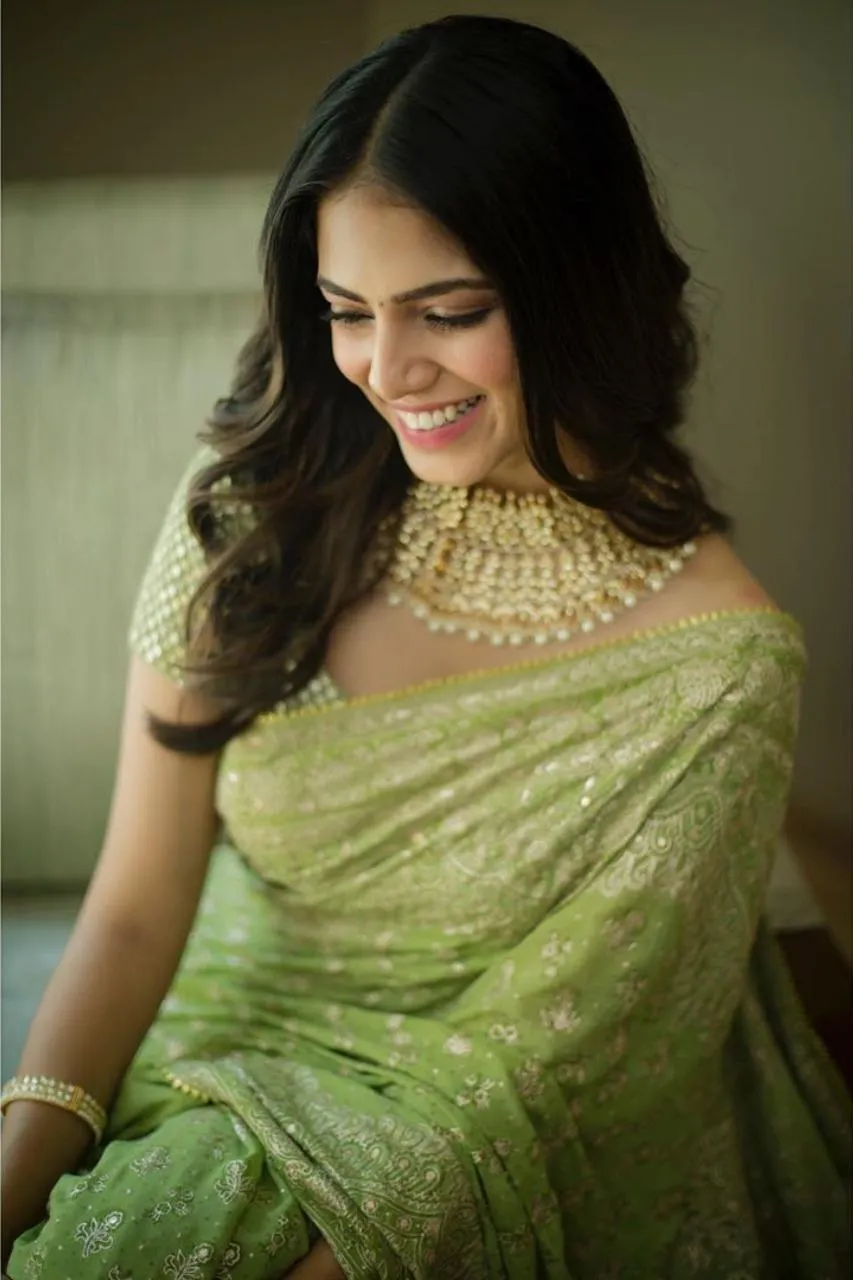 Sensual Malavika Mohanan in Green Saree Graceful Look Image