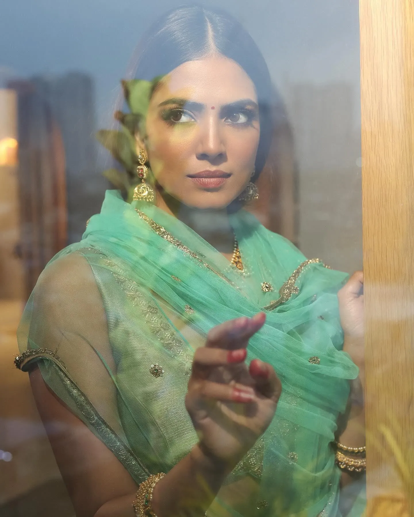 Sensual Malavika Mohanan in Green Saree Traditional Glance