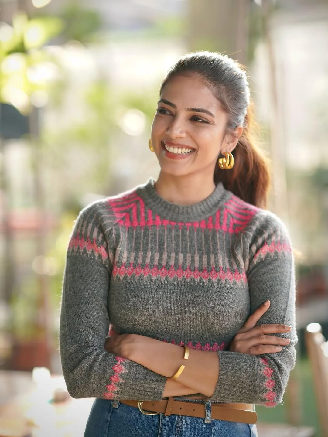 Sensual Malavika Mohanan in Grey Sweater Smiling Casual