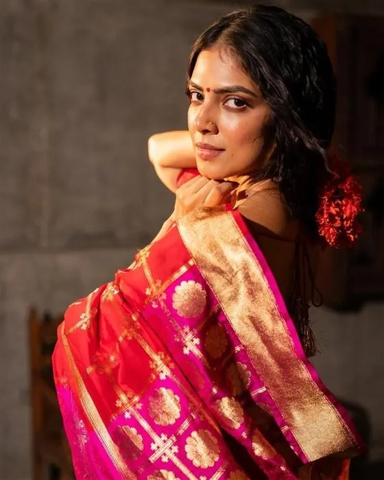 Sensual Malavika Mohanan in Red Saree with Elegant Hair