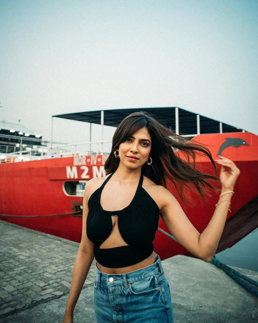 Sensual Malavika Mohanan in Sleeveless Black Top Posing