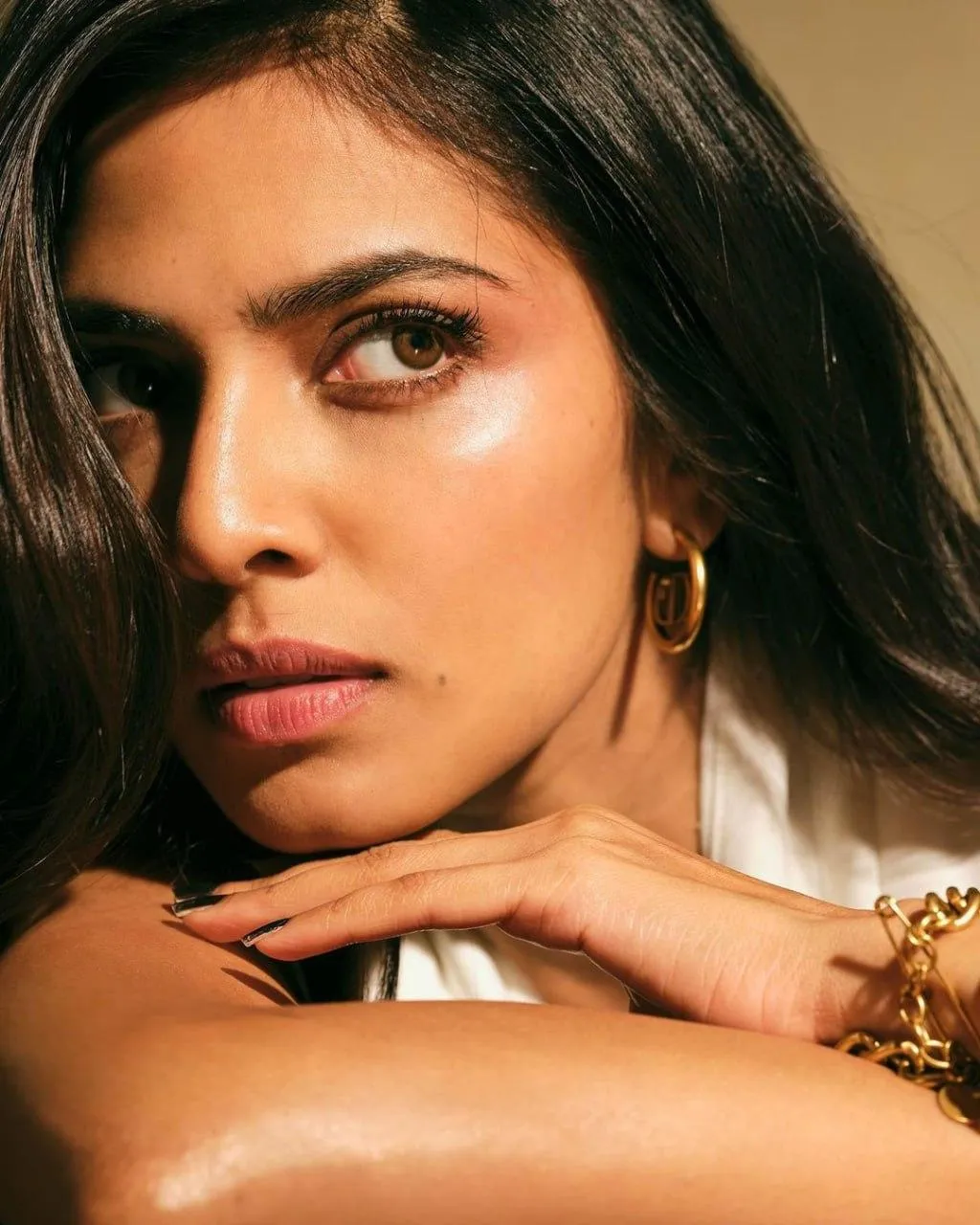 Sensual Malavika Mohanan in White Top Closeup Hand on Face