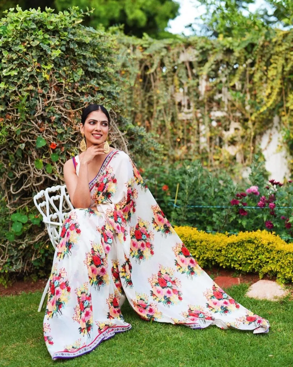Sensual Malavika Mohanan Outdoor Pose in Floral Outfit