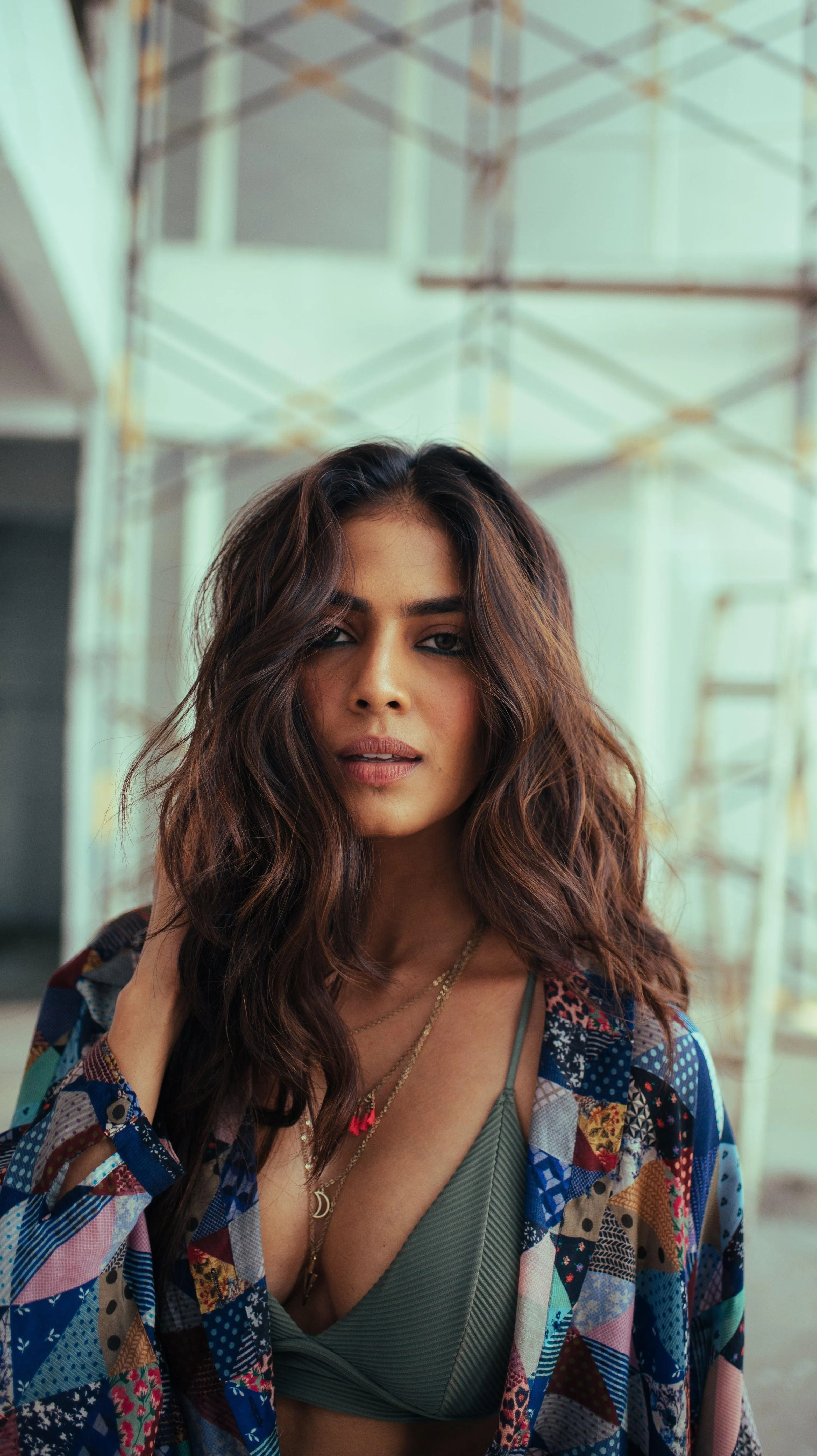 Sensual Malavika Mohanan Posing in Floral Printed Dress
