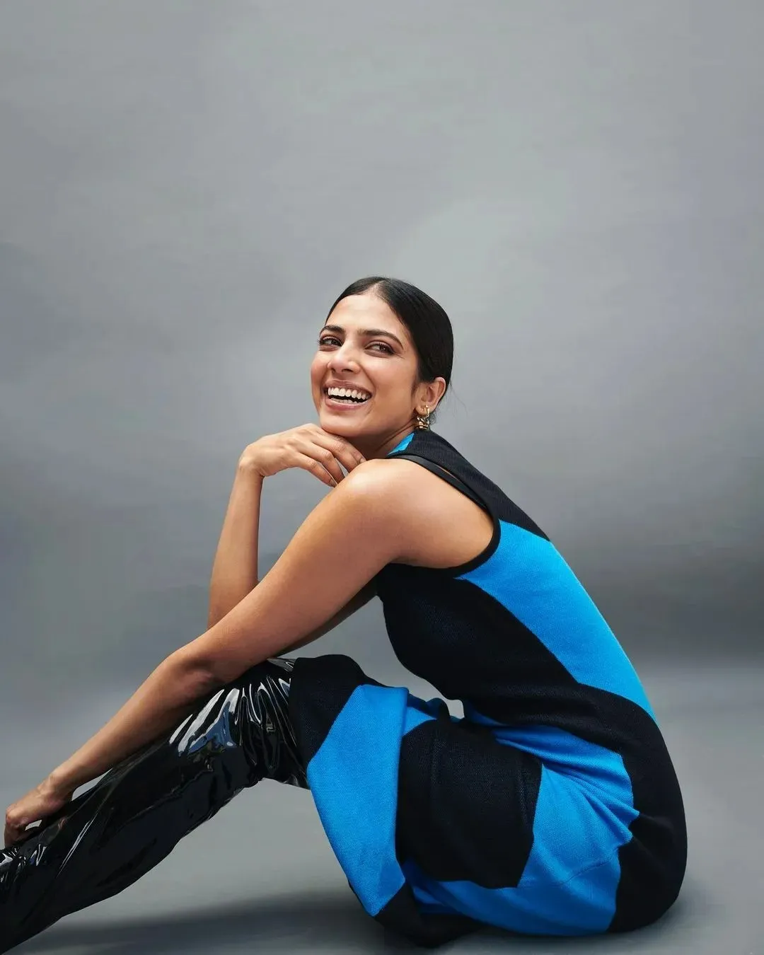 Sensual Malavika Mohanan Sitting by Pool in Blue Dress Look