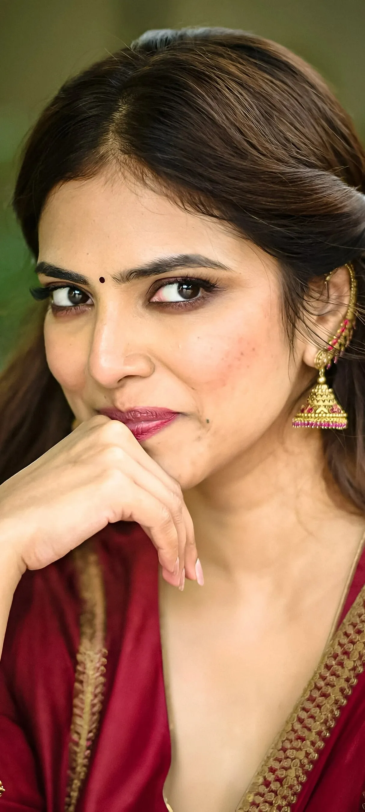 Sensual Malavika Mohanan with Charming Smile and Beauty