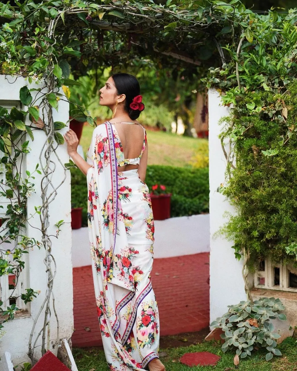 Stunning Malavika Mohanan Chic Outdoor Pose in Floral Set