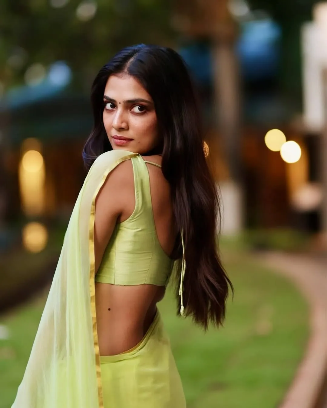 Stunning Malavika Mohanan Glows in Gold Saree Shoot Image
