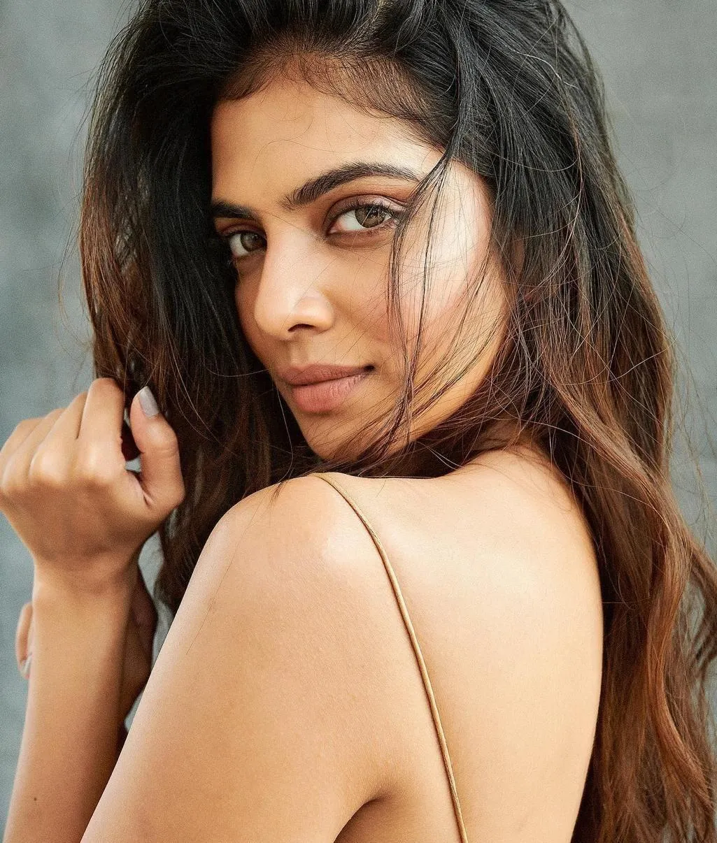 Stunning Malavika Mohanan in Black Dress Striking Closeup