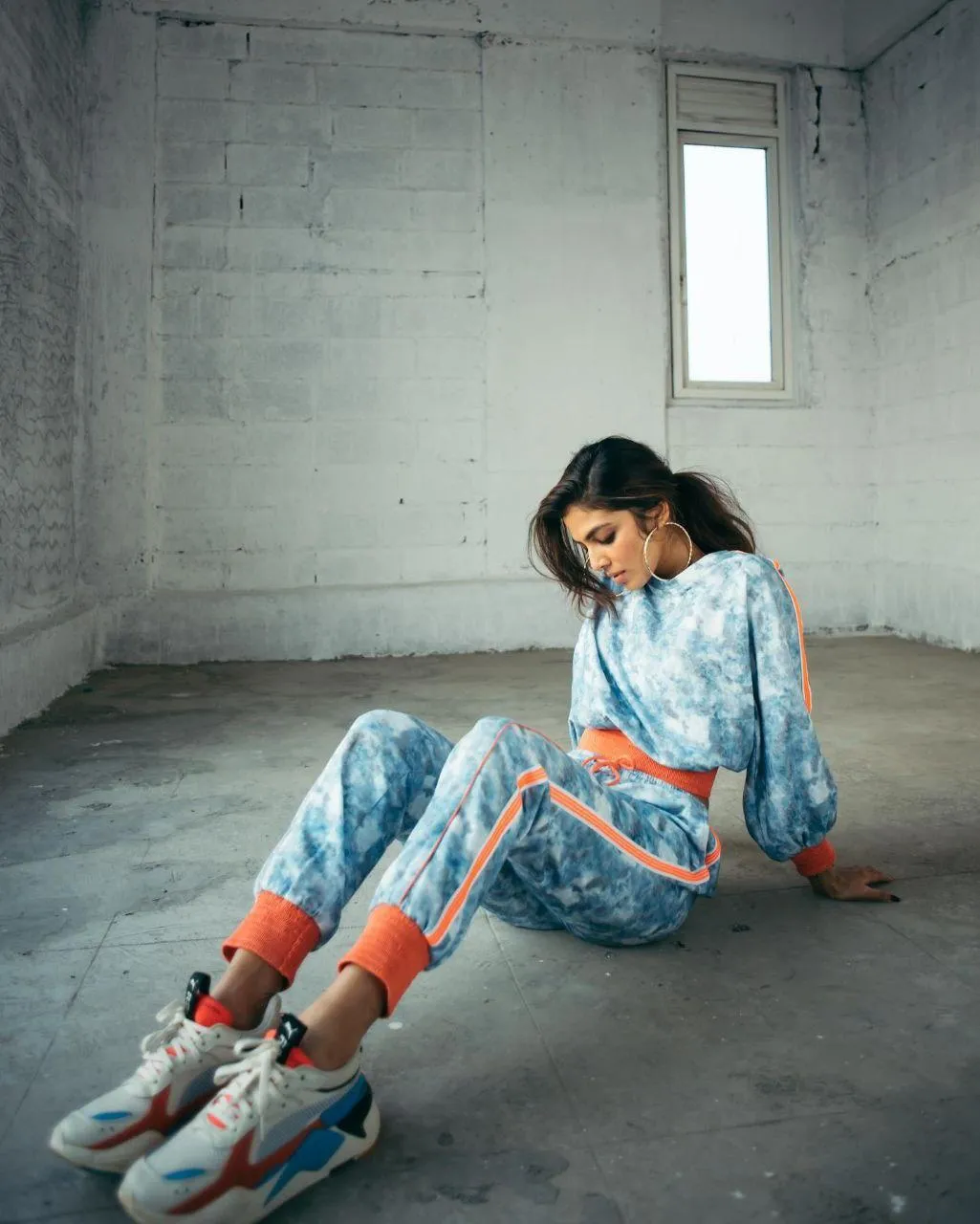 Stunning Malavika Mohanan in Blue Co Ord Sitting Pose