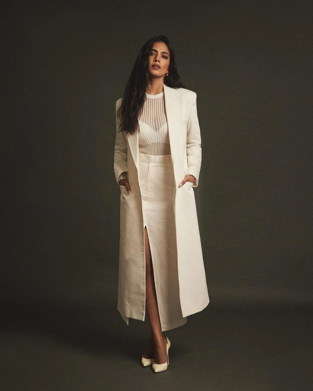 Stunning Malavika Mohanan in Chic White Long Coat Dress