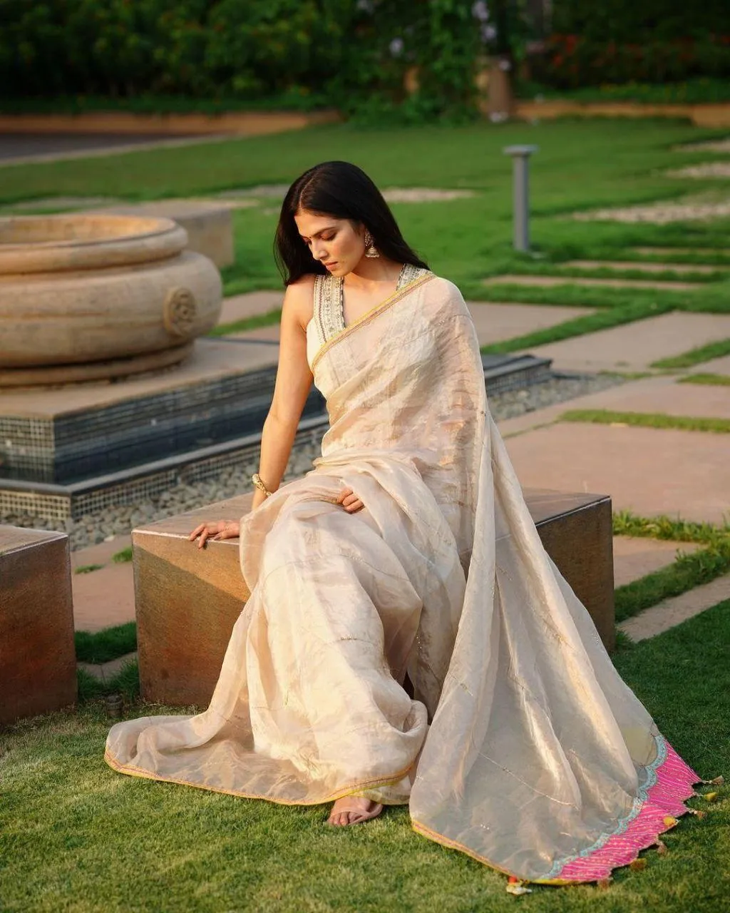 Stunning Malavika Mohanan in Cream Saree Outdoor Elegance