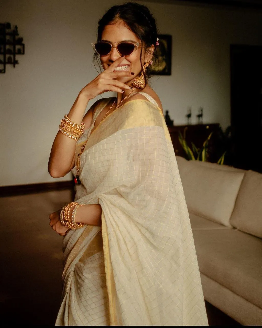 Stunning Malavika Mohanan in Cream Saree with Grace Look