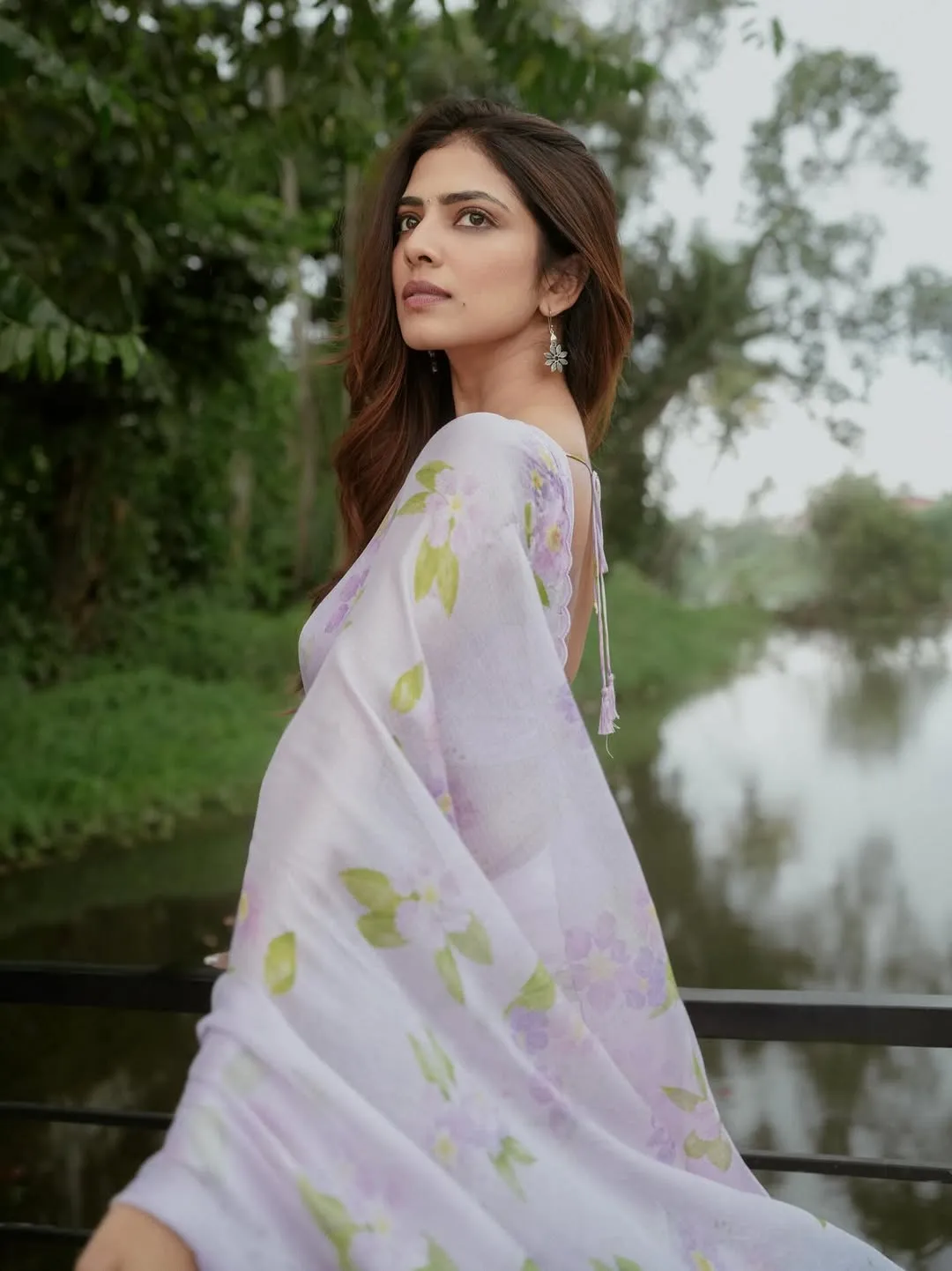 Stunning Malavika Mohanan in Traditional Saree in Garden