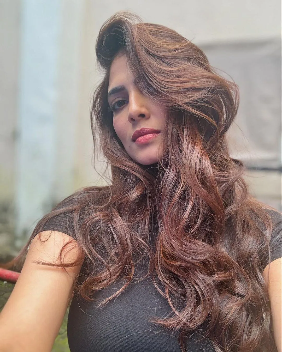 Stunning Malavika Mohanan in Wavy Hairstyle Indoor Portrait