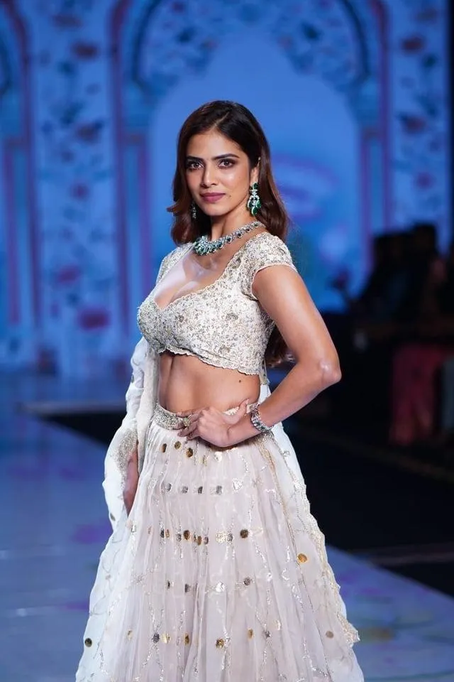 Stunning Malavika Mohanan in White Dress Stage Fashion Image