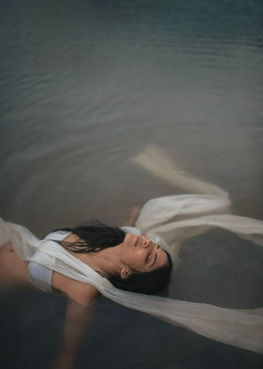 Stunning Malavika Mohanan in White Saree Beside the Sea