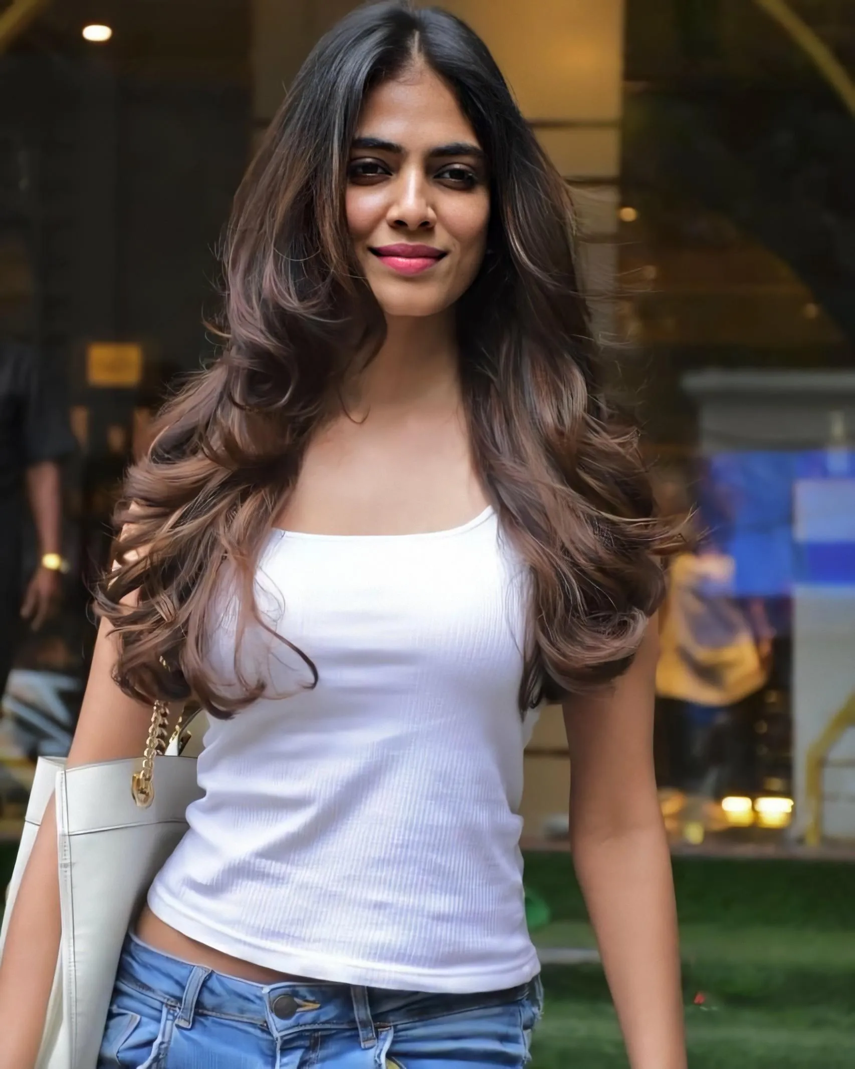 Stunning Malavika Mohanan in White Top with Green Pants