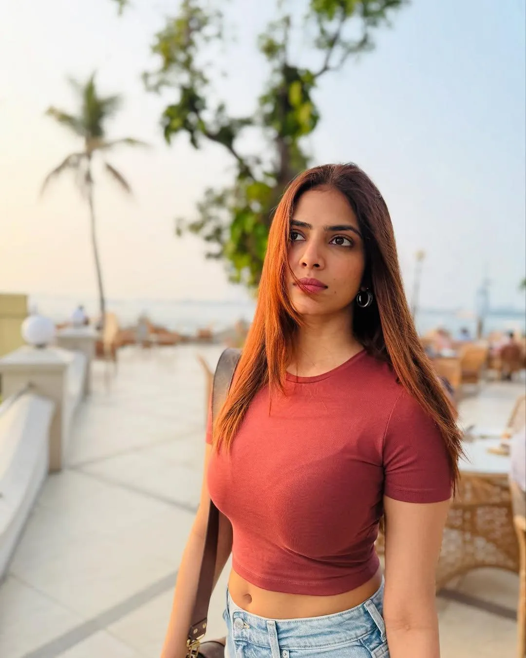 Stunning Malavika Mohanan Poses Confidently in Red Outfit