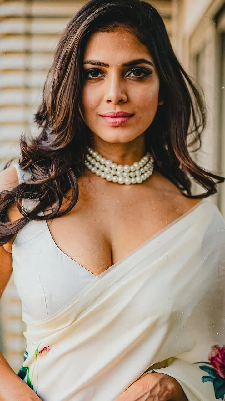 Stunning Malavika Mohanan Wearing Classic White Dress Image