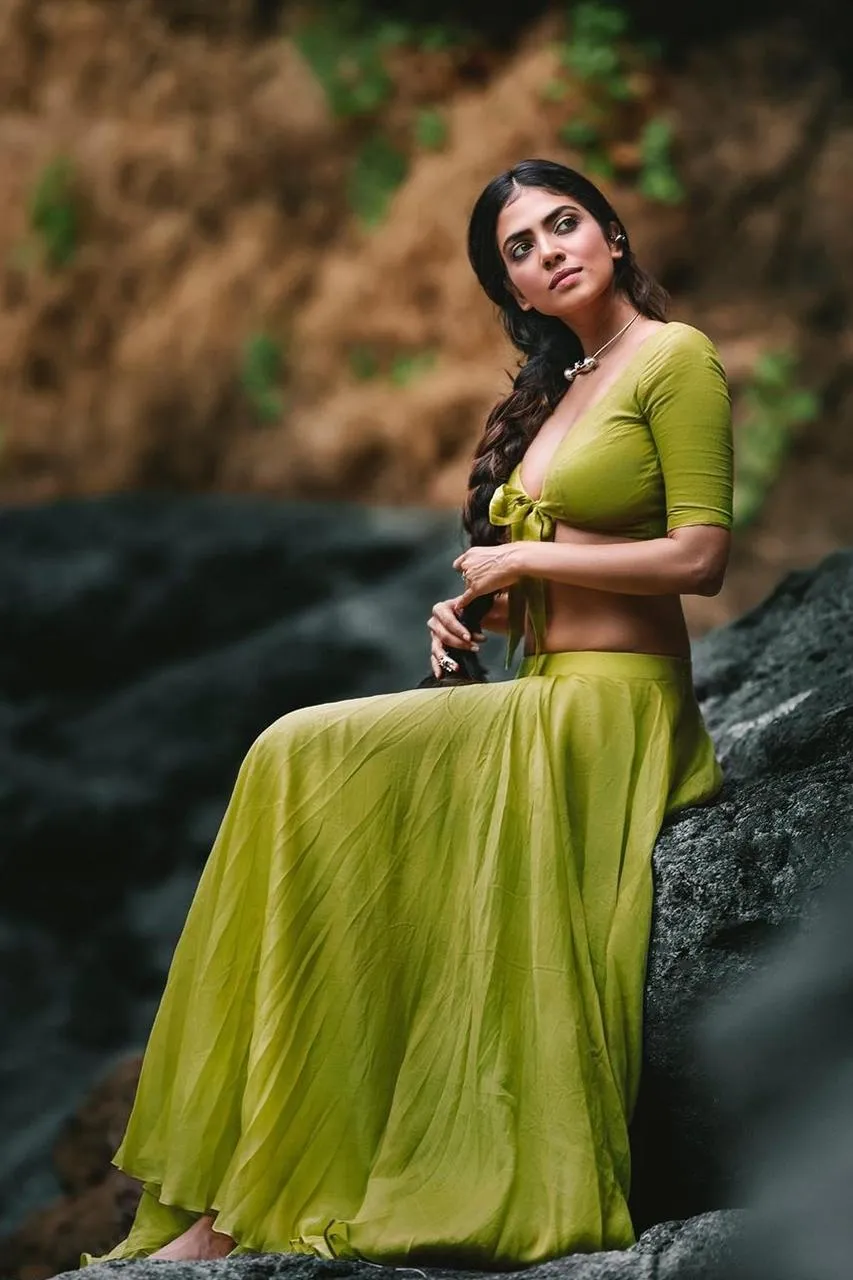Stunning Malavika Mohanan Wearing Green Dress Outdoors Image