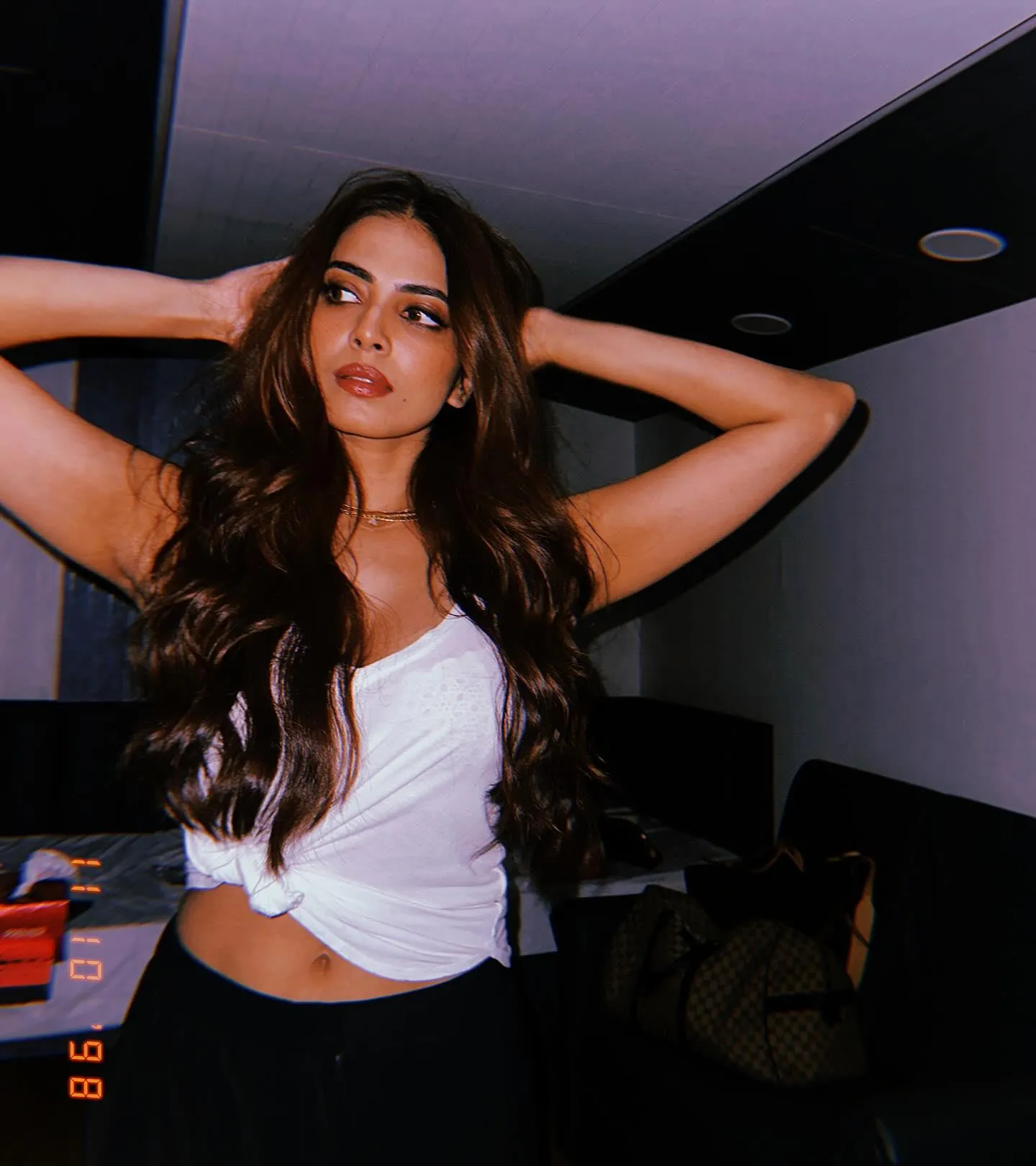 Stunning Malavika Mohanan Wearing White Top Bold Pose Image