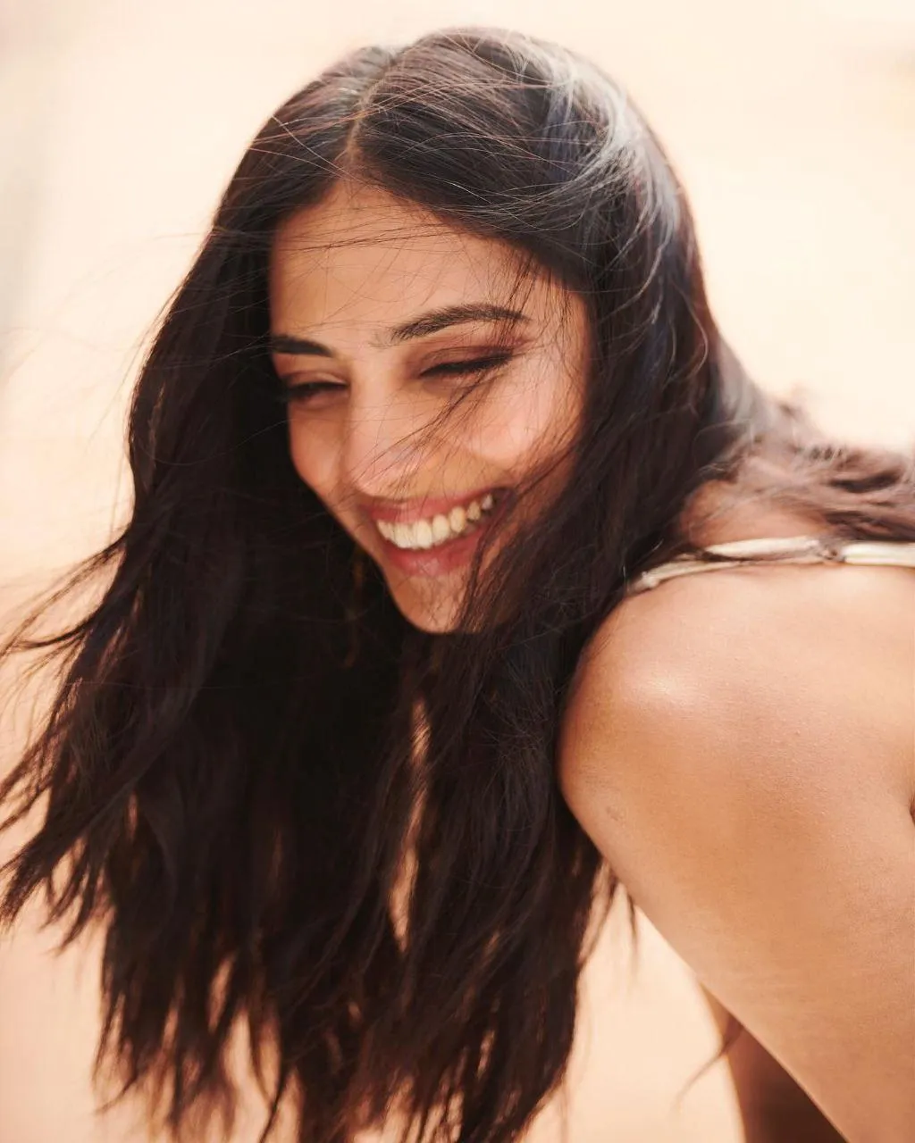 Stunning Malavika Mohanan with Flowing Hair in Casual Pose