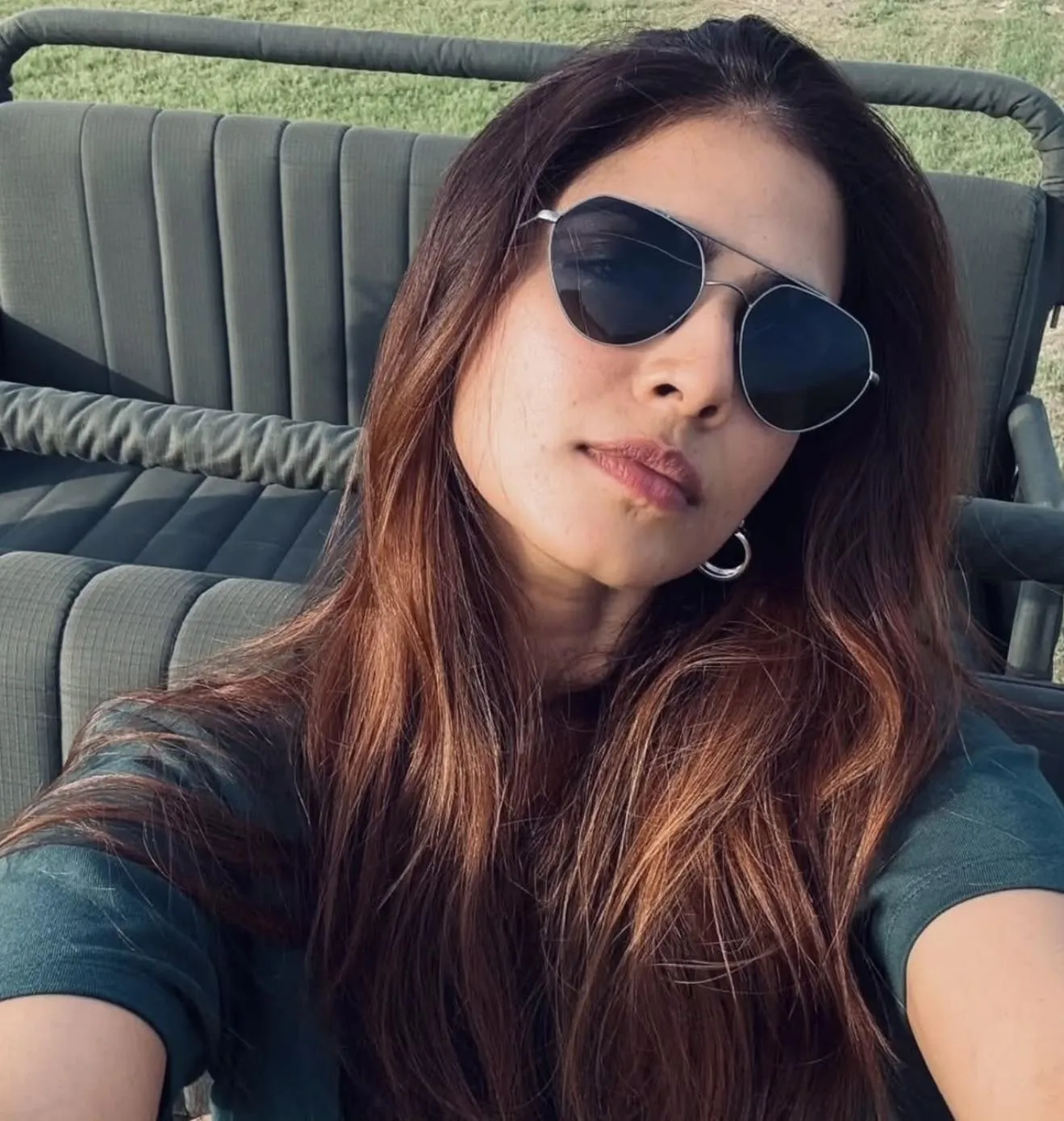 Stylish Malavika Mohanan in Black Top with Dark Glasses